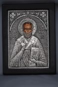 A modern Orthodox Icon of Saint Nicholas, stamped '950', image area 13.5 cm by 19.