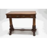 A late 19th Century mahogany two drawer writing table,
