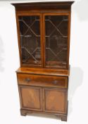 A George III style mahogany and satinwood banded secretaire bookcase,
