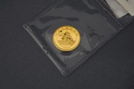 A China Gold Panda 1998 1/20 oz 5 Yuan coin,