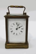 A large brass cased carriage clock, striking on a bell, 16.