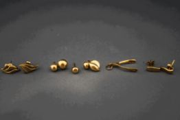 Two pairs of 9 carat gold earrings; an unmarked pair and single earstud;