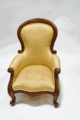 A Victorian style mahogany framed armchair,