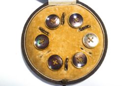 A set of six dress buttons, stamped '9ct', in mother of pearl, 6.