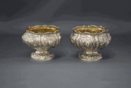A pair of late George IV silver salts, Clement Cheese, London 1829, later embossed with fruit,