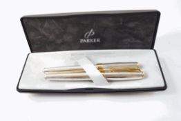 A Parker Sonnet 'silver cascade' fountain pen and ballpoint pen set, the former with 18K gold nib,