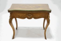 A 19th century Louis XVI style walnut and kingwood crossbanded marquetry card table,