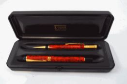 A Parker Duofold Centennial ballpoint pen and propelling pencil set, jasper red,