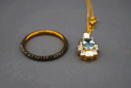 A 9 carat gold black diamond full eternity ring, finger size R,