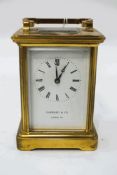 A Garrard & Co brass carriage clock, with winding key, 15cm high,