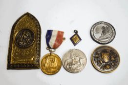 A George III Coronation medal, a WWII medal, a National Rose medal, two further,