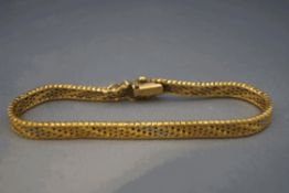 A 9 carat gold three colour gold bracelet,