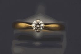 A diamond single stone 9 carat gold ring, the brilliant cut of approximately 0.