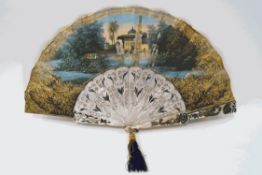 An 18th century French fan, painted with a scene of a marriage celebration to one side,