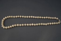 A row of freshwater cultured pearls,