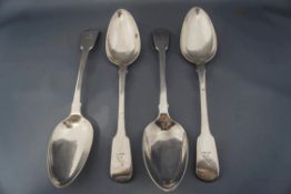 A set of four George III silver tablespoons, by Eley & Fearn, London 1816, fiddle pattern, crested,