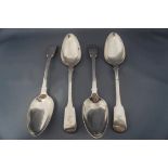 A set of four George III silver tablespoons, by Eley & Fearn, London 1816, fiddle pattern, crested,