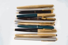 Two Parker fountain pens with 12ct gold caps, a Parker Curzon fountain pen,