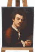 French School, late 18th century Portrait of a young man holding a pen Oil on canvas,