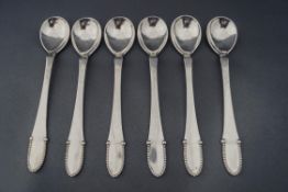 A set of six Georg Jensen bead pattern silver coffee spoons,