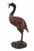A cold painted bronze figure of a crane, on naturalistic base,