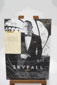 A James Bond 'Skyfall' film poster, signed by Daniel Craig and the director Sam Mendes,