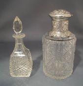 A Victorian silver mounted cut glass scent bottle, with stopper, London 1884, 14cm high,