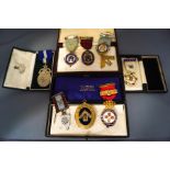 A collection of six silver Masonic medals; another medal in gilded and enamelled metal;