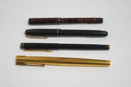 Four Waterman fountain pens including a 'Super 6' fountain pen with 18ct gold nib,