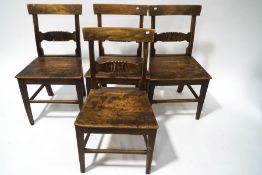 A set of four 19th century mahogany chairs with carved rail backs,