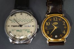 A Russian calendar wrist watch; and a modern 'Guess' fashion wristwatch;