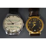 A Russian calendar wrist watch; and a modern 'Guess' fashion wristwatch;