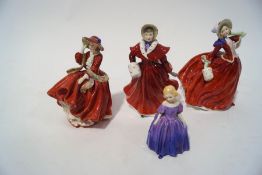 Four Royal Doulton Figures, one with head glued, Autumn Breezes HN1934, The Skater HN3439,