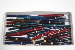 Thirty four Parker fountain pens, many with 14ct gold nibs,