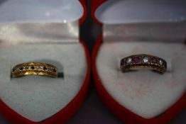 A 9 carat gold diamond and sapphire half eternity ring;