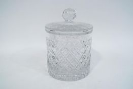 A 20th century cut glass biscuit barrel and cover,