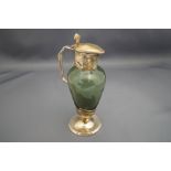 A silver mounted and green glass small claret type jug, by William Hutton & Sons, London 1903,