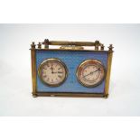 An Elgin brass combination desk clock, with aneroid barometer and compass,