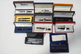 A collection of fountain and rollerball pens, including Pelikan, Kingsley, Rotring, Sailor,