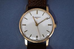 Longines, a gentleman's 9 carat gold wrist watch, presented by Wilkinson Sword for 25 years service,