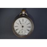 Waltham, an open faced pocket watch, the signed white enamel dial with black Roman numerals,