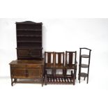 A quantity of oak dolls furniture comprising a sideboard, a dresser, a dining room table,