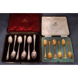 A cased set of six silver gilt coffee spoons, by Walker & Hall,