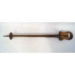 A 19th century shooting stick, the pierced walnut handle opening to for the seat,
