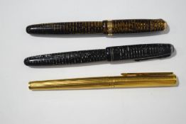 A vintage Parker Vacumatic fountain pen, with 14K nib, made in Canada, brown and gold striated body,