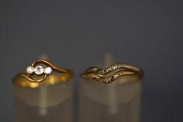 A 9 carat gold two colour diamond set double ring, set with single cuts, finger size J, 2.
