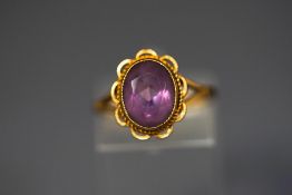 An amethyst single stone ring, stamped '9ct', finger size M, 2.
