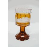 A Victorian Bohemian amber flash glass with flared foot, engraved with a scene of 'Coln', 15.
