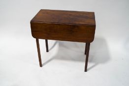 A 19th century mahogany Pembroke table with chamfered square legs, 69cm high x 42.