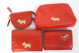 Two Radley purses and two Radley wallets, all with a Scottie dog on a red ground,